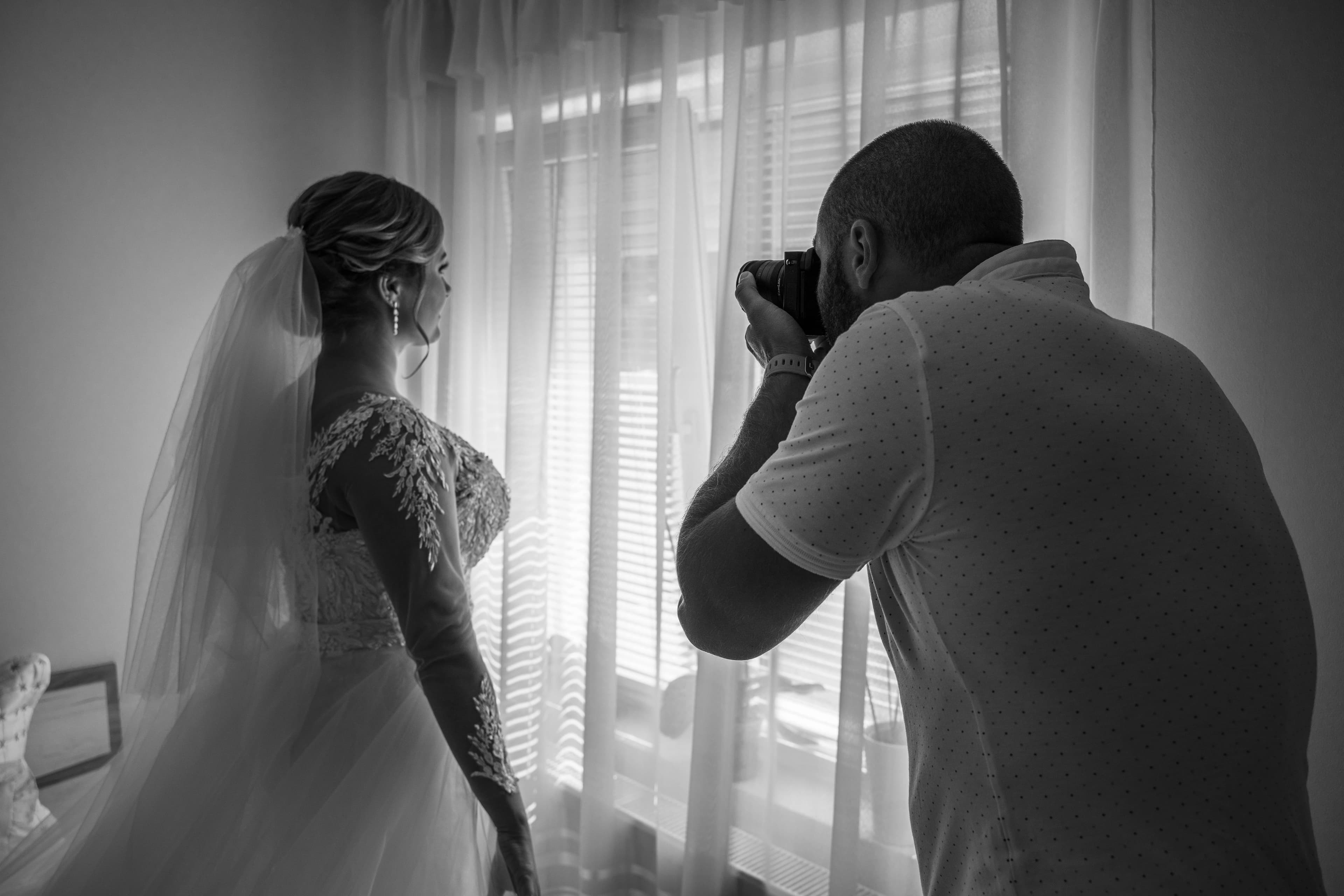 A bride photographed in soft window light
